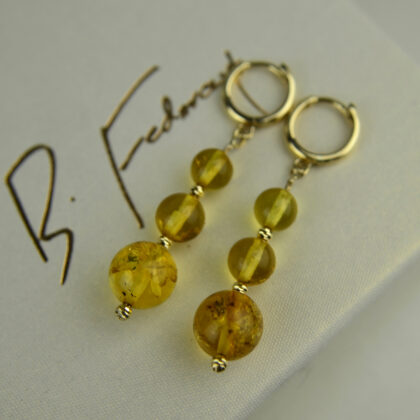 Złote wiszące kolczyki ze słonecznym bursztynem pr. 585
