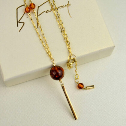 Długi złoty naszyjnik z koniakowym bursztynem pr. 585