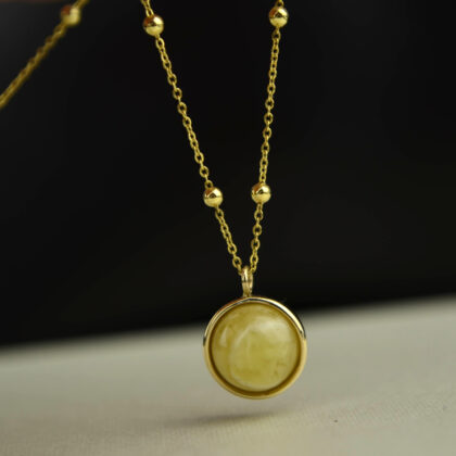 Złoty naszyjnik z mlecznym bursztynem pr. 585